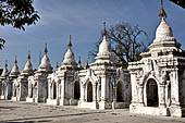 Myanmar - Mandalay, Kuthodaw Pagoda. 729 white pitaka pagodas contain the Tipitaka, the sacred texts of Theravada Buddhism. 